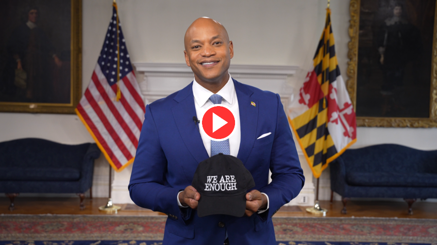 Governor Wes Moore holding cap