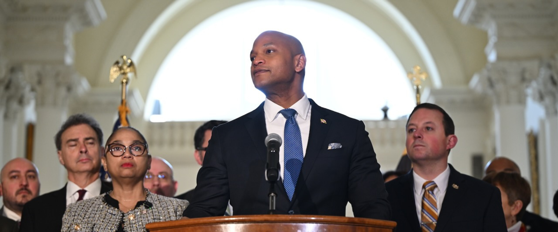 Governor Moore speaking at lecturn