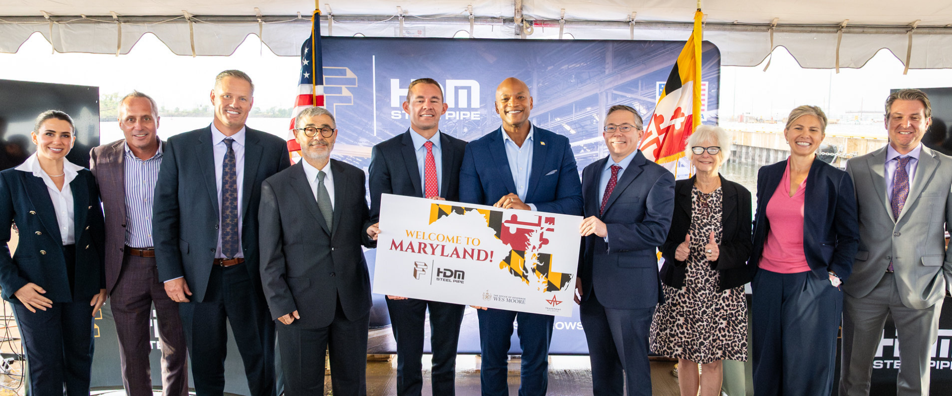 Group photo on site with Governor Moore