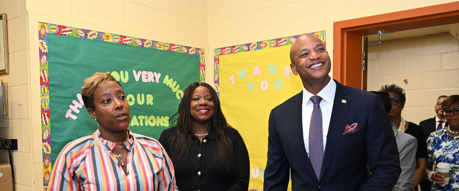 Governor Moore with Executive Director of United Communities Against Poverty Rasheeda Jamison-Harriott and Prince George's County Executive Aisha N. Braveboy

