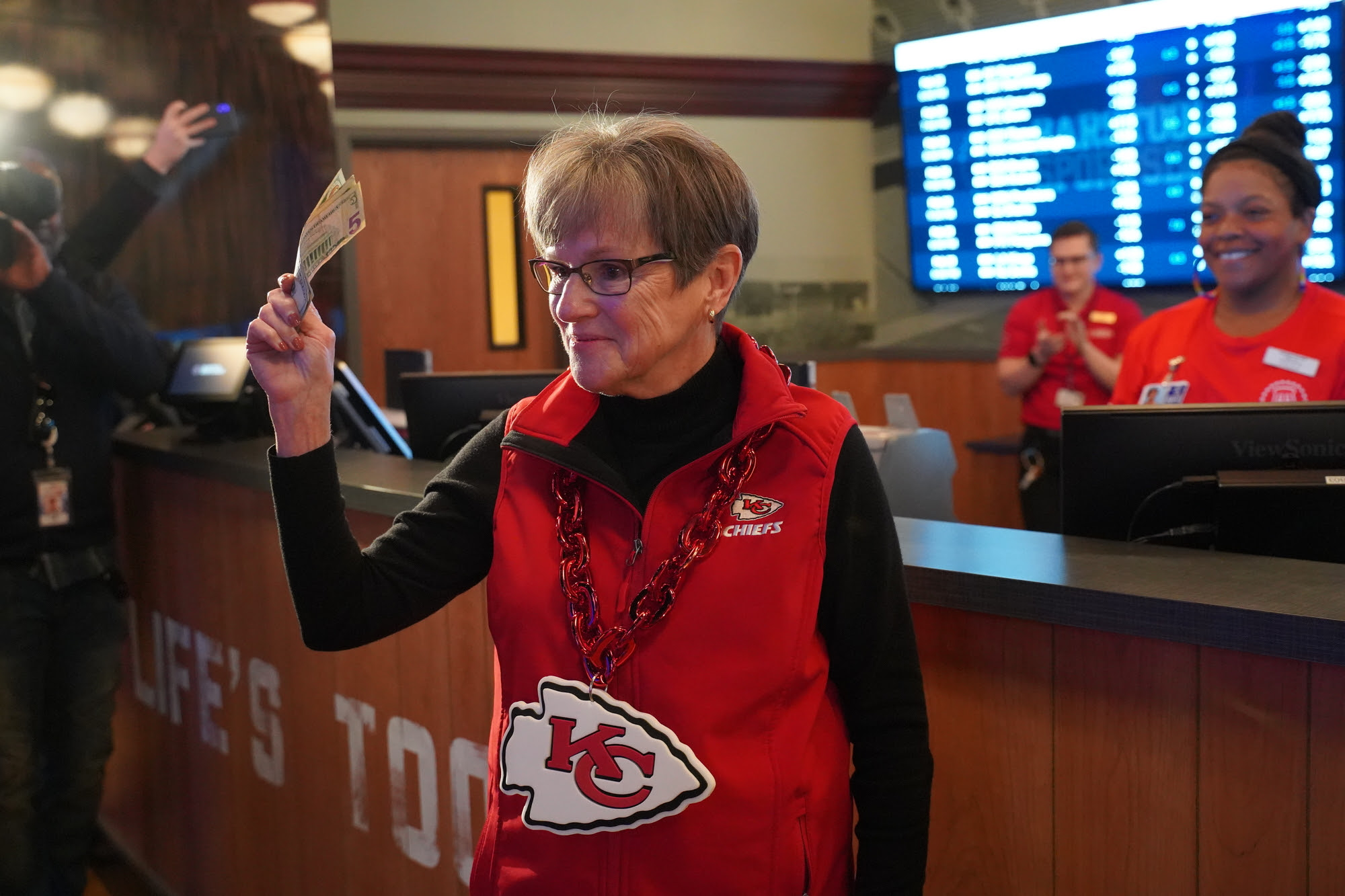 Governor Laura Kelly wearing Chiefs jersey