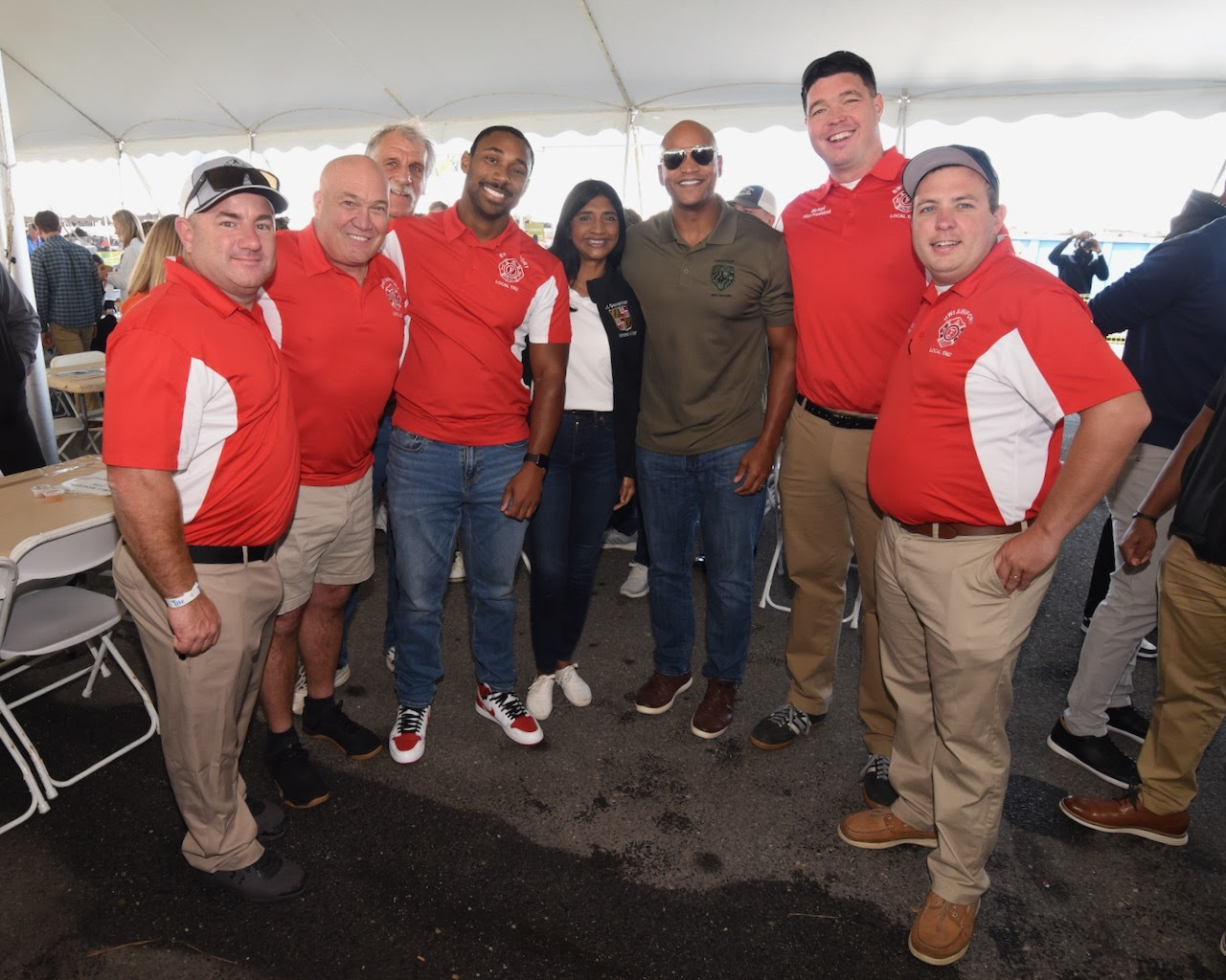 Governor Moore and Lieutenant Governor Miller stand with attendees at the Tawes Crab and Clam Bake.