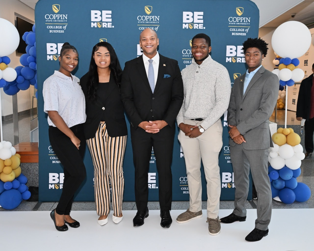 Governor Moore with students at Coppin State University