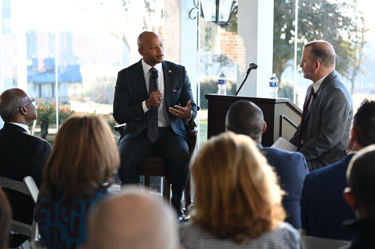 Governor Moore speaks with the moderator and crowd at The Owings Mills Corporate Roundtable event.