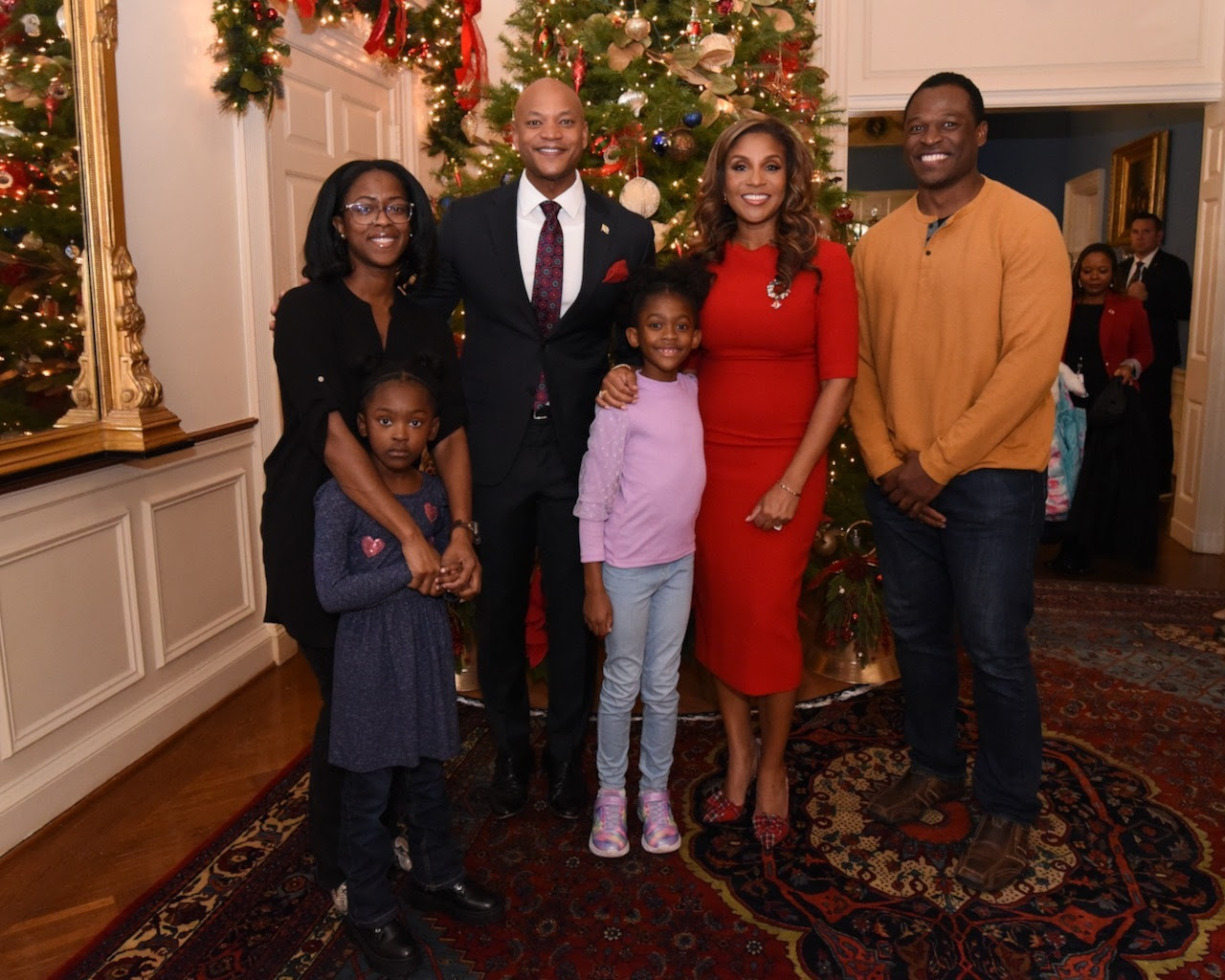 Governor and First Lady Moore celebrate the holidays with families at Government House.